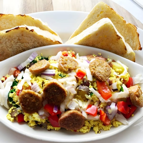 Bodacious Pizza & Grill's breakfast scramble with sausage, peppers, onions, and toast.